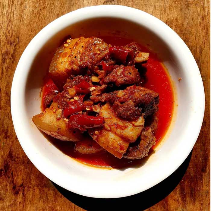 Pork gravy with bamboo shoot is another popular dish of Nagaland 