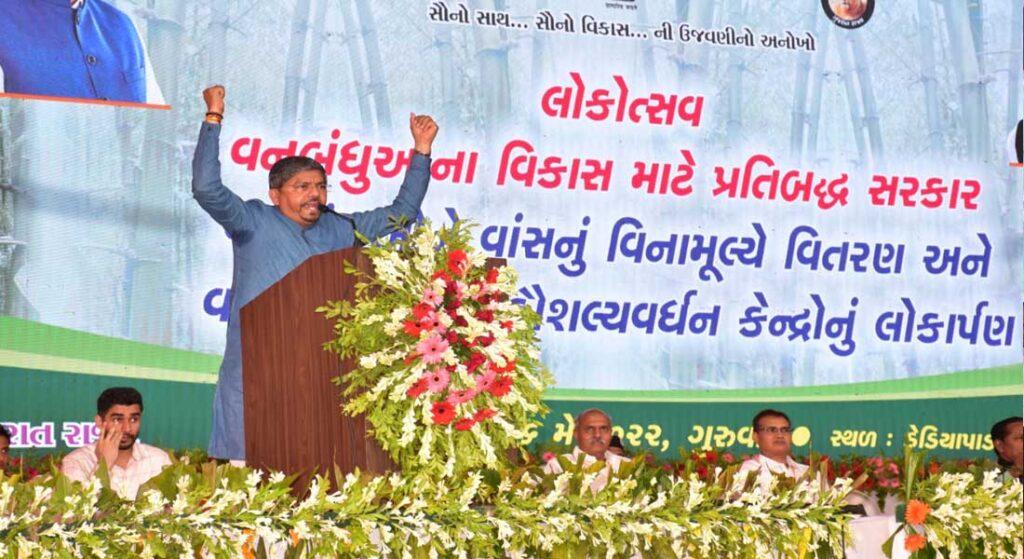 Gujarat Tribal Development Minister Naresh Patel addressing the audience