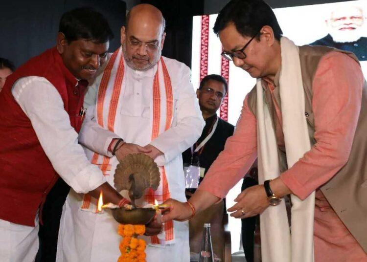 Union Ministers Amit Shah, Arjun Munda and Kiren Rijiju lighting teh traditional lamp during inauguration of NTRI
