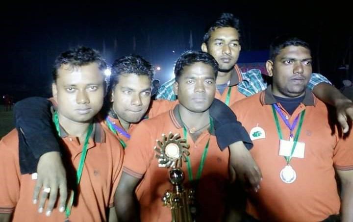 Rajendra Murmu (centre) With Teammates And Trophy