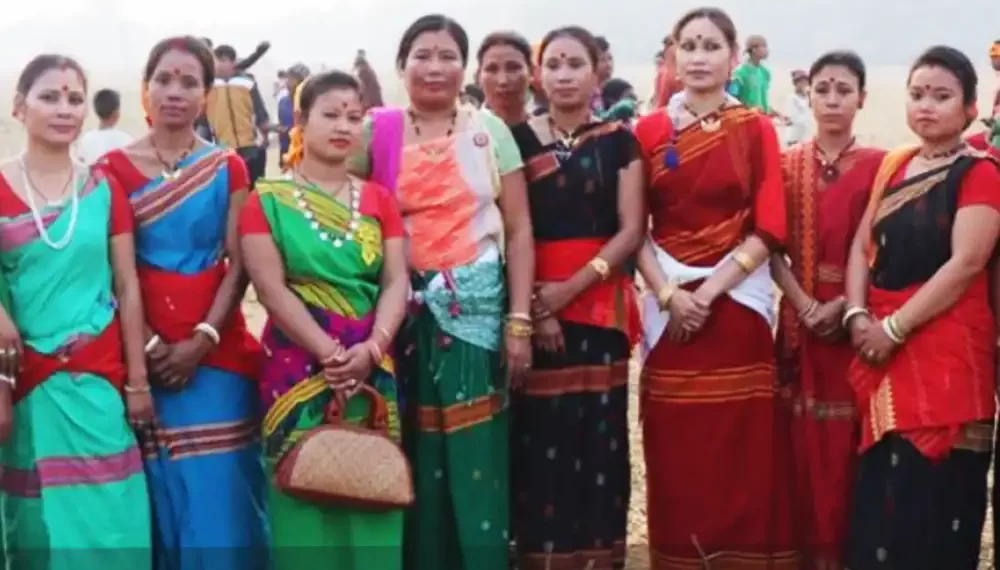 A Group Of Women From Tiwa Community, A Tribe Residing In Nagaon & Morigaon) Dressed Up To Sing Harvest Songs On Agricultural Land