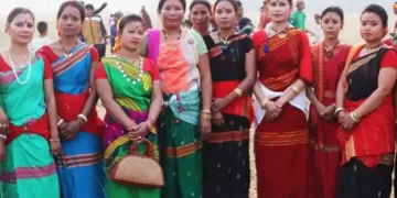 A Group Of Women From Tiwa Community, A Tribe Residing In Nagaon & Morigaon) Dressed Up To Sing Harvest Songs On Agricultural Land