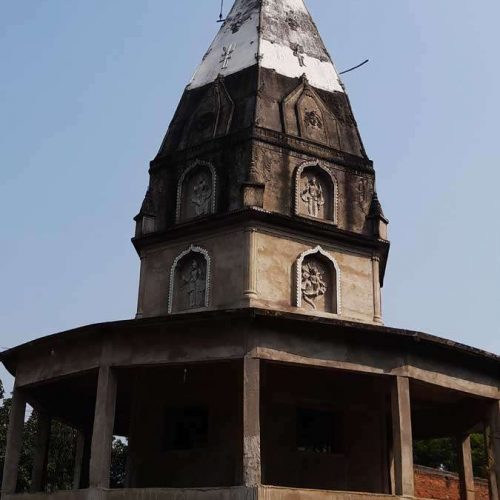 A view of a new temple coming up down the hillock