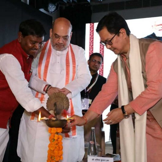 Union Ministers Amit Shah, Arjun Munda and Kiren Rijiju lighting teh traditional lamp during inauguration of NTRI